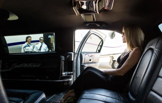 woman sitting in a limo